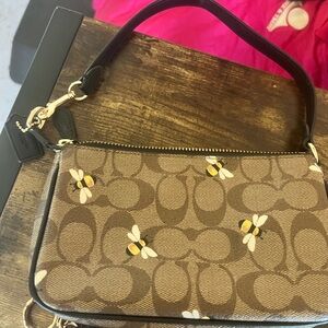 Coach wristlet used once or twice for a special occasion rare print